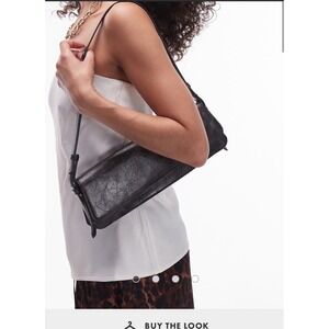 Topshop Stassi elongated shoulder bag in distressed black - Sold Out